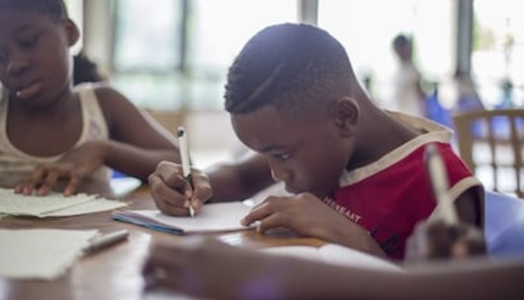 An image representing a child engaged in learning activities.