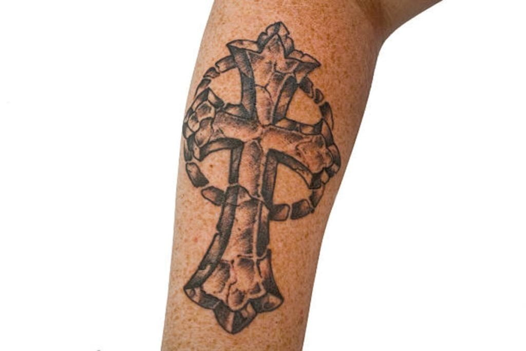 Adding Flowers to a Cross Flower Tattoo