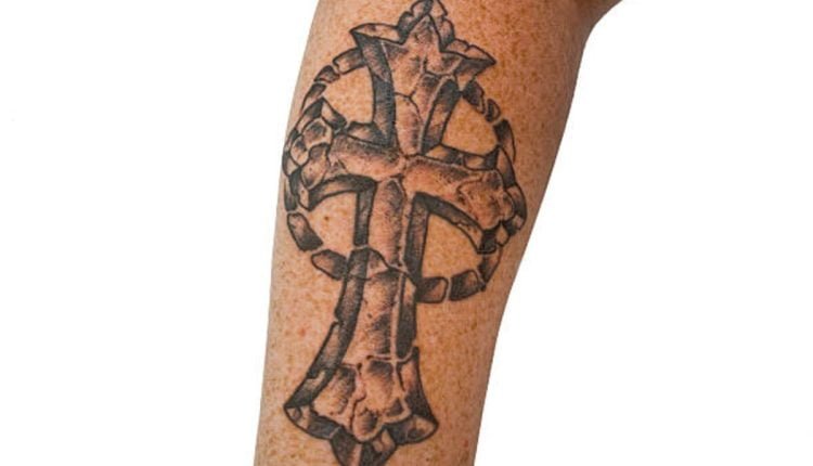 Adding Flowers to a Cross Flower Tattoo