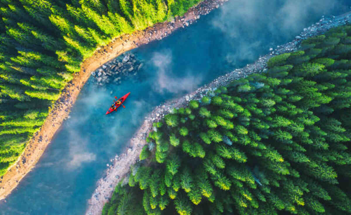 Eedr River - A winding blue river surrounded by lush greenery